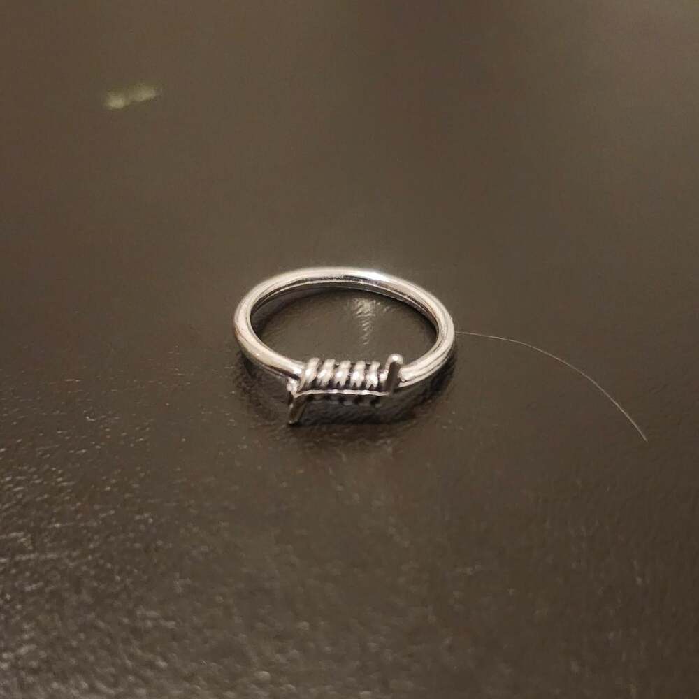 Silver Ring With A Coiled 74 Db